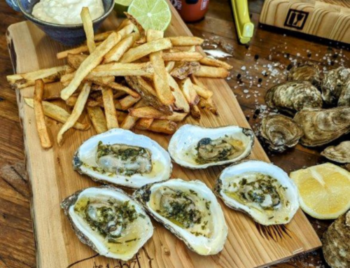 Grilled PEI Oysters and Citrus Herb Butter with Frites and Garlic Aioli.